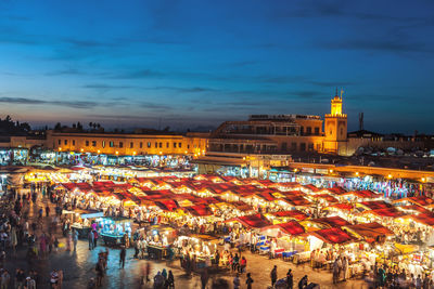 High angle view of illuminated city at dusk