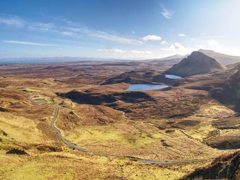 Breathtaking view from quiraing mountains into vallley. sunny day. isle of skye, scottish highlands.