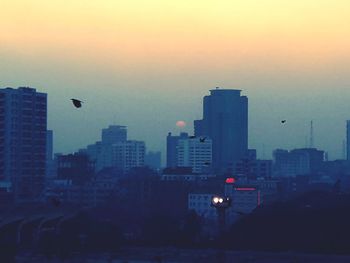 View of cityscape at sunset