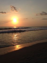 Scenic view of sea at sunset