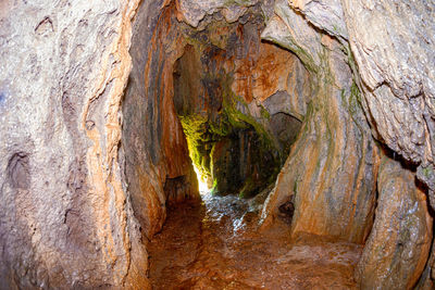 Close-up of rock formation in water