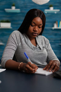 Young woman using mobile phone