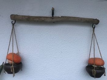 Close-up of food on table against wall