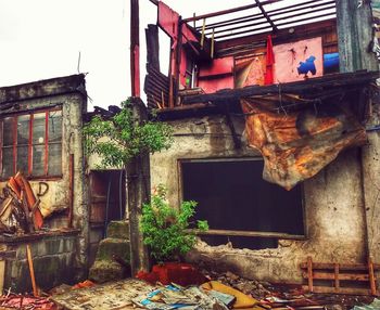 Abandoned house against sky