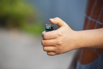 Close up hand with lighter