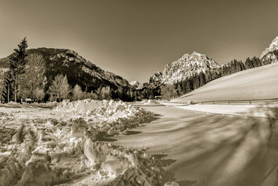 Scenic view of snowcapped mountains against sky