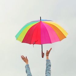 Close-up of hand holding white background