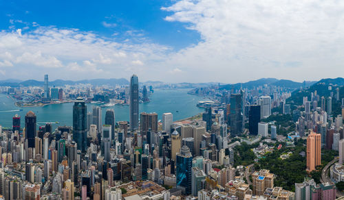 Aerial view of modern buildings in city against sky