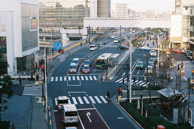 High angle view of vehicles on road in city