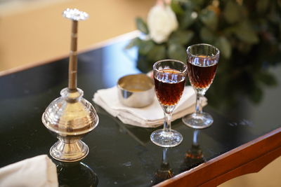 Close-up of wineglass on table