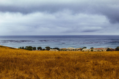 Scenic view of calm sea against sky