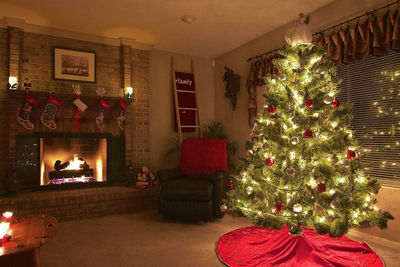 Illuminated christmas tree at home