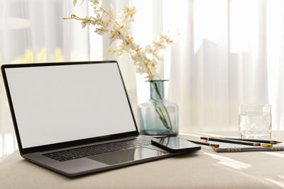 Close-up of laptop on table