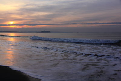 Scenic view of sea at sunset