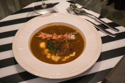 High angle view of soup in bowl on table