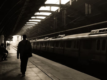 People at railroad station platform