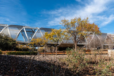 Modern metal footbridge over manzanares river in madrid.