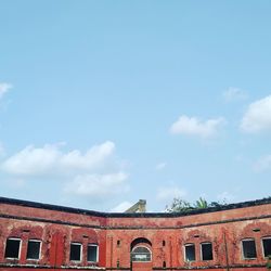 Low angle view of old building against sky