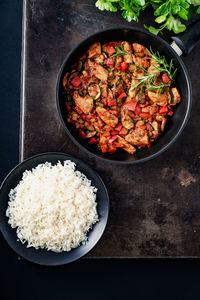 High angle view of chopped vegetables in bowl on table