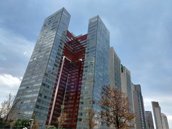 Low angle view of modern building against sky