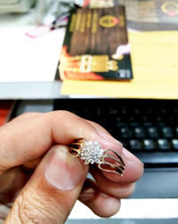 Close-up of person holding hands