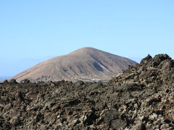 Scenic view of mountains against clear sky