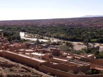 High angle view of buildings against clear sky