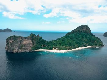 Panoramic view of sea and rocks against sky