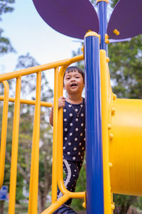 Boy playing in playground