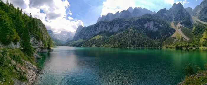 Panoramic view of lake and mountains against sky