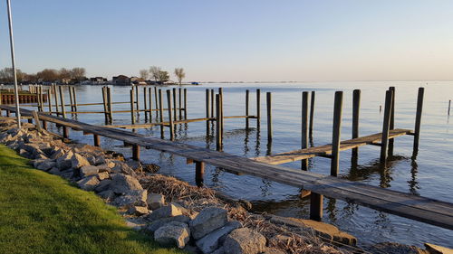 Jetty at calm blue sea