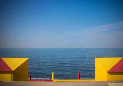 Scenic view of sea against blue sky