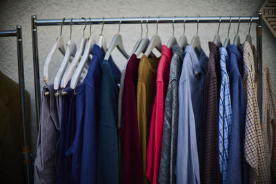 Close-up of clothes hanging on rack