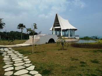 Gazebo by building against sky