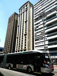 Low angle view of modern office building against sky