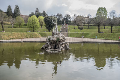 View of statue in park against sky