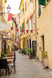 Empty chairs and tables in restaurant
