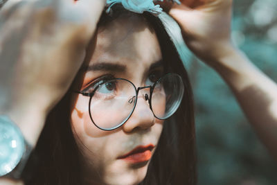 Close-up portrait of young woman