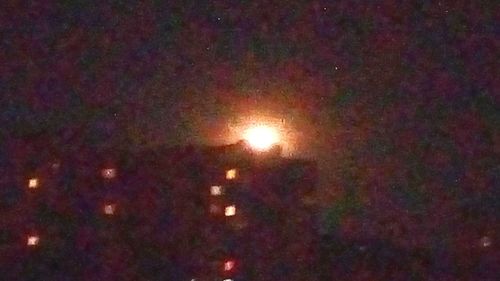 Close-up of illuminated moon at night
