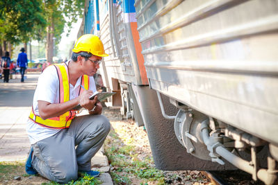 Man working on mobile phone