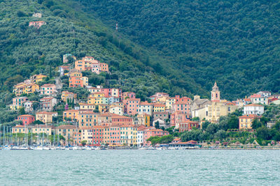 La spezia, italy, july 30, 2023. view of the village of cadimare from the sea.
