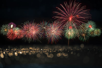 Firework display at night