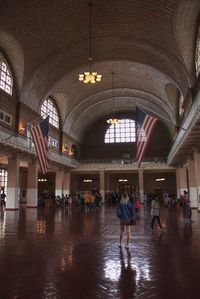 People walking at railroad station