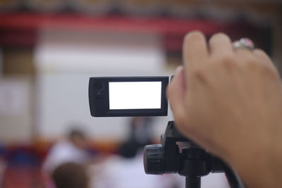 Human hand holding smart phone