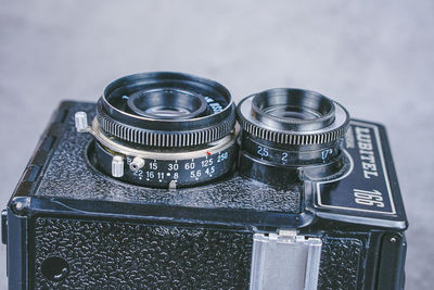 Close-up of camera on table