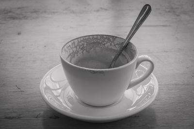 Close-up of coffee cup on table