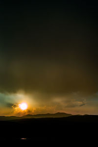 Scenic view of dramatic sky during sunset