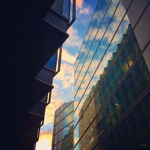 Low angle view of modern buildings against sky