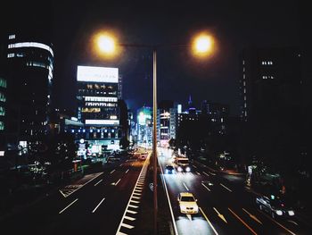 High angle view of light trails on city street