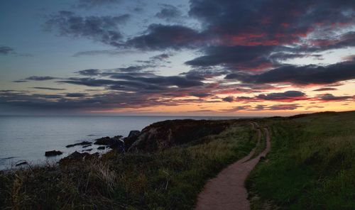 Scenic view of sea against sky during sunset